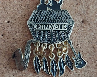 Grizmatik hat pin