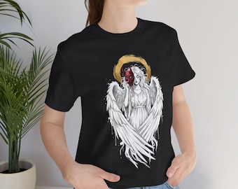 Camiseta con ilustración de ángel quitándose la máscara de demonio / halo dorado