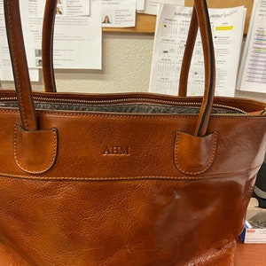 Custom Engraving on leather bags ,Personalize initials on bags ,Custom Initials ,text engraving directly on the leather image 3