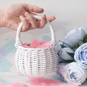 Small white flower girl basket with a handle