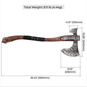 May include: A detailed axe with a wooden handle, measuring 35.43 inches (900mm) long. The axe head is silver with intricate designs and blue accents. The handle is wrapped in black leather. Total weight is 9.11 lb (4.4kg).