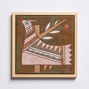 Our Bird Wall Hanging features stunning geometric designs that bring any space a unique and modern touch. The vibrant colors and bold designs will transform any room in your home, making it a beautiful focal point that will draw the eye.