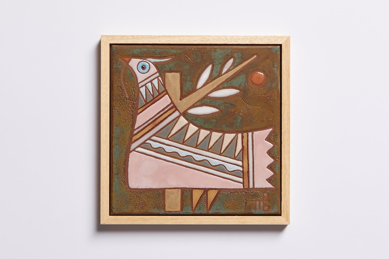 Our Bird Wall Hanging features stunning geometric designs that bring any space a unique and modern touch. The vibrant colors and bold designs will transform any room in your home, making it a beautiful focal point that will draw the eye.