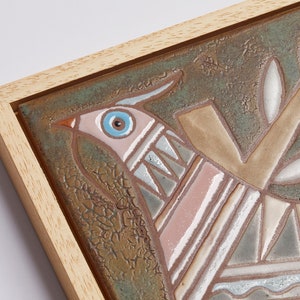 This eye-catching decoration features a unique geometric design that brings a modern yet timeless look to your living space. With its intricate shapes and detailed craftsmanship, this piece of art will instantly brighten up any room.