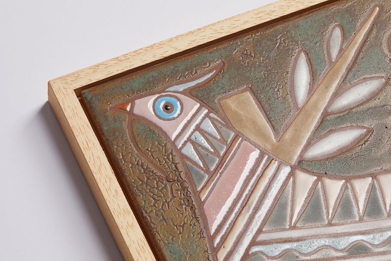 This eye-catching decoration features a unique geometric design that brings a modern yet timeless look to your living space. With its intricate shapes and detailed craftsmanship, this piece of art will instantly brighten up any room.