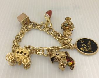 Antique Vintage Estate 14Kt Charm Bracelet with 6 Unique Charms with a Professional 8500.00 appraisal