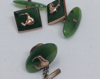 ntique 9ct Gold Jade Cufflinks and Tie Tac with Gold Bird on each piece.