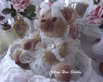 Célestine, little vintage bear girl, in her basket, on a sahbby note; tinged with white!