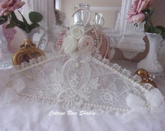 Vintage ornamental hanger, romantic shabby atmosphere, imbued with softness,