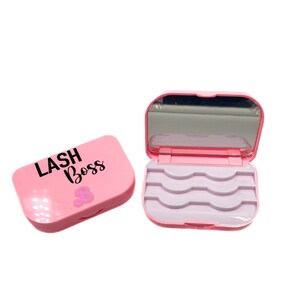May include: Pink lash storage case with a mirror and five compartments. The case has the text "LASH Boss" printed on the front.