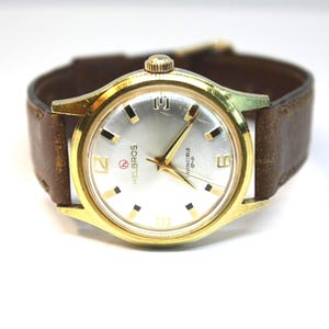 Vintage Helbros Invincible Mens Watch 33mm Gold Tone Day Date Leather Manual HELBROS INVINCIBLE MANUAL Wind Gold Tone Vintage Mens Watch  main image 3