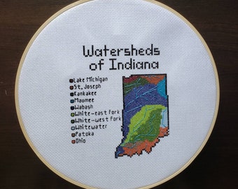 Watersheds of Indiana, completed cross stitch, framed in 10 inch hoop