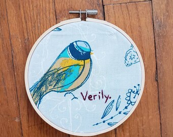 Verily. bird completed embroidery, framed in 5 inch hoop