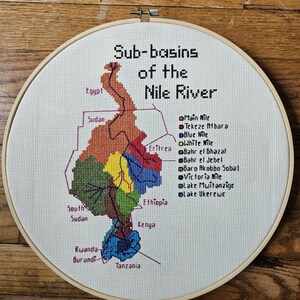 Nile Watershed and sub-basins, completed cross stitch, framed in 12 inch hoop