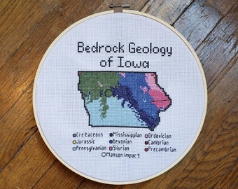 Iowa Bedrock Geology completed cross stitch, framed in 10 inch hoop