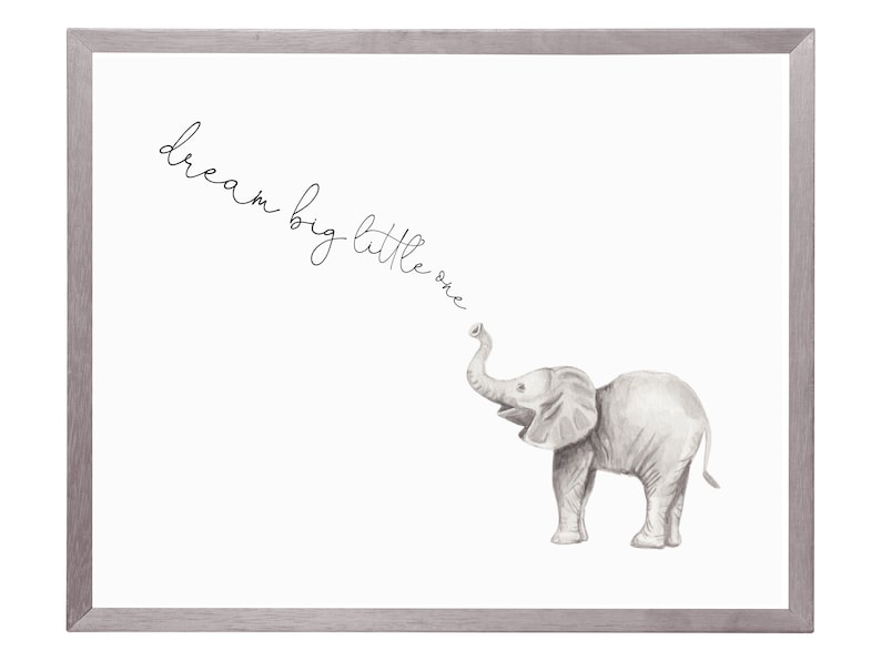 May include: A framed print with a black and white illustration of a baby elephant with its trunk raised. The text "dream big little one" is written in cursive above the elephant.