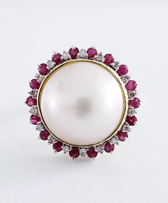 Gorgeous mabe pearl, gold,diamond and ruby ring.
