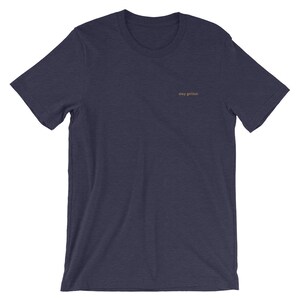 Heather Midnight Navy short-sleeve tee with the phrase Stay Golden embroidered in gold thread.