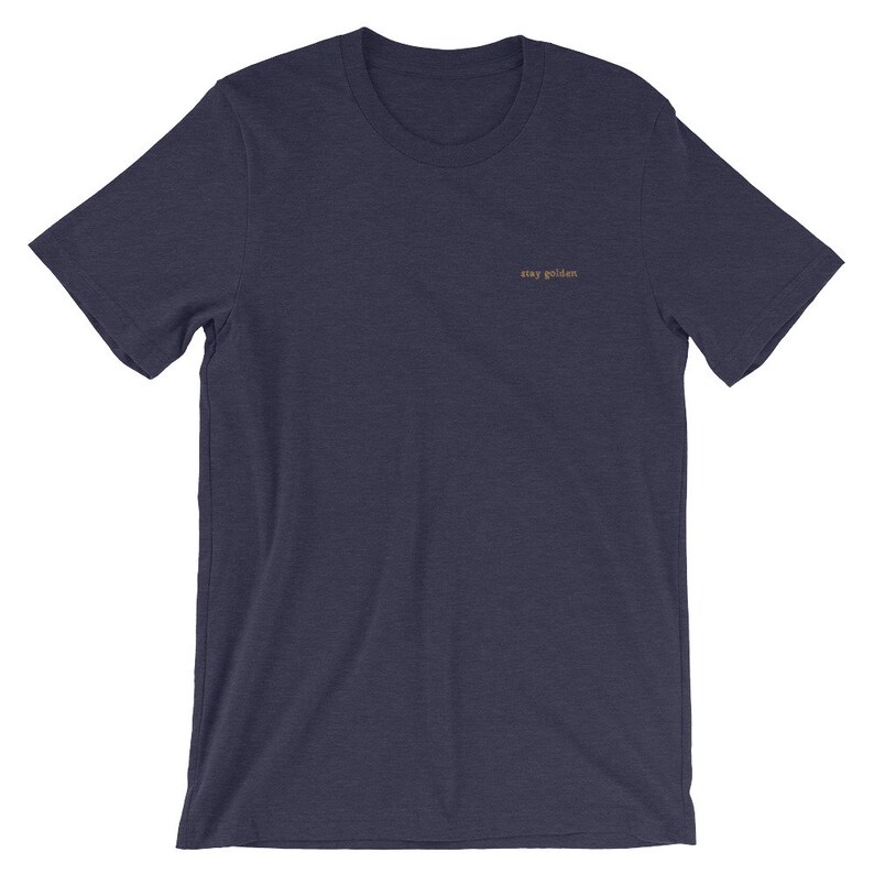 Heather Midnight Navy short-sleeve tee with the phrase Stay Golden embroidered in gold thread.