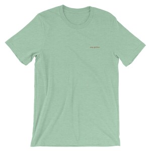Heather Prism Mint short sleeve tee with the phrase Stay Golden embroidered in gold thread.