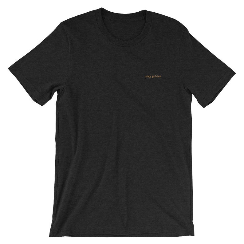 Heather Black short-sleeve tee with the phrase Stay Golden embroidered in gold thread.