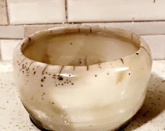 Handmade naked Raku pot. Naked raku