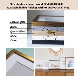 May include: A close-up of a wooden picture frame with a variety of finishes, including antique gold, silver, natural wood, white, and black. The frame is labeled "Sisi and Seb Print Shop" and features a small orange citrus fruit with a leaf. The frame is available in five finishes with or without a 2-inch mat.