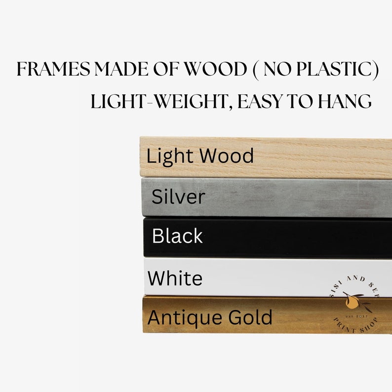 May include: Five wood picture frames stacked on top of each other. The frames are in the following colors: light wood, silver, black, white, and antique gold. The bottom frame has the text "Sisi and Sew Print Shop" printed on it.