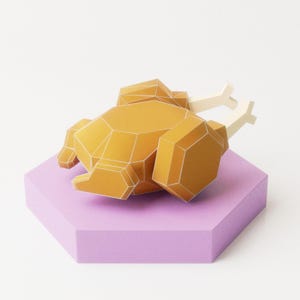 May include: A papercraft model of a roasted chicken, with a light brown color and white lines, sitting on a purple hexagonal base.