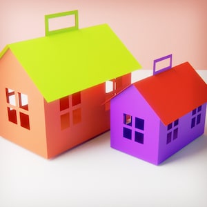 Pode incluir: Três casas de papel em tamanhos e cores diferentes. A maior casa é laranja com um telhado verde, a casa do meio é roxa com um telhado vermelho e a menor casa é roxa com um telhado vermelho.