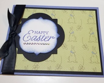 Tarjeta de Pascua en capas con cinta y joyas