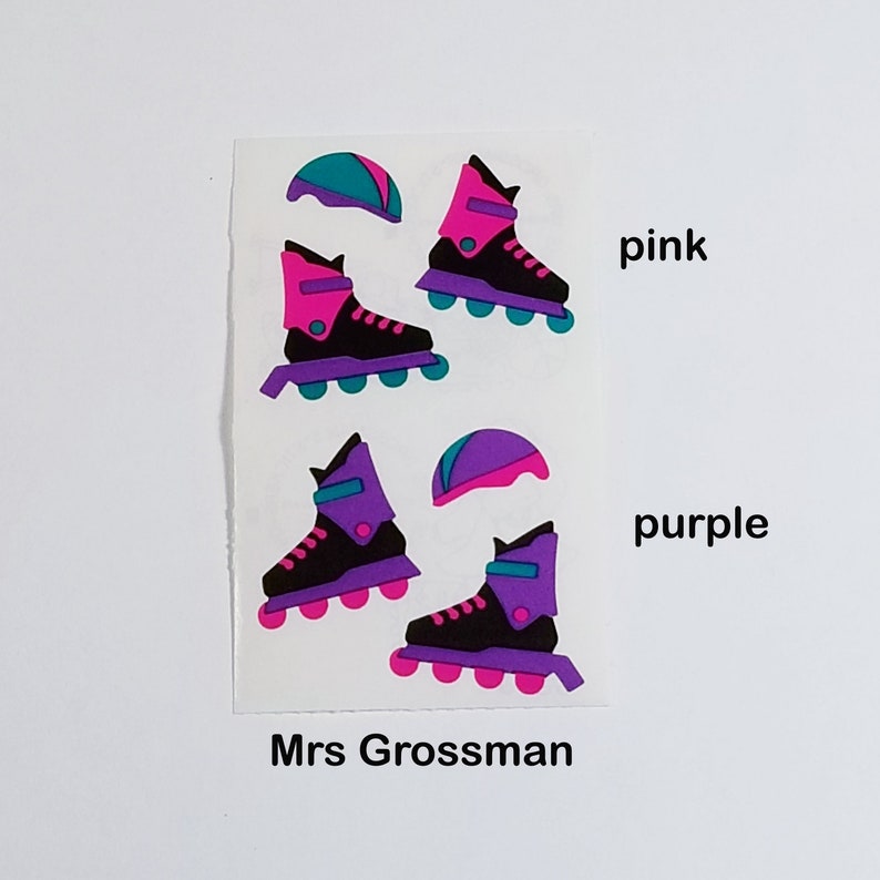 May include: A sheet of stickers featuring roller skate designs. The stickers are in pink and purple with black outlines. The text "Mrs Grossman" is printed at the bottom of the sheet.