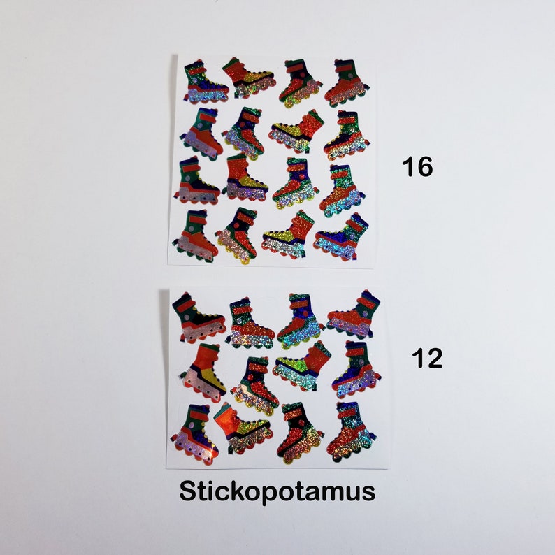 May include: A sheet of colorful roller skate stickers with a holographic finish. There are 16 stickers on the top sheet and 12 on the bottom sheet. The text "Stickopotamus" is printed at the bottom of the sheet.