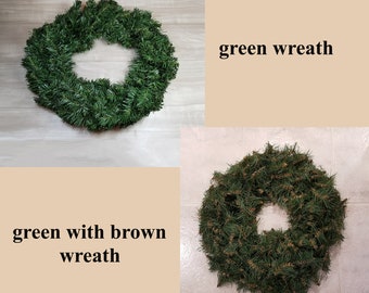 May include: Two wreaths, one green and one green with brown accents. Both wreaths are made of pine branches and are circular in shape.