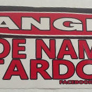 May include: A white and red danger sign with the text "DANGER" in a red oval. Below the danger sign is the text "JOE NAMELESS TARDCORE!" in red letters. A black and white skull with a chef's hat is on the left side of the sign.