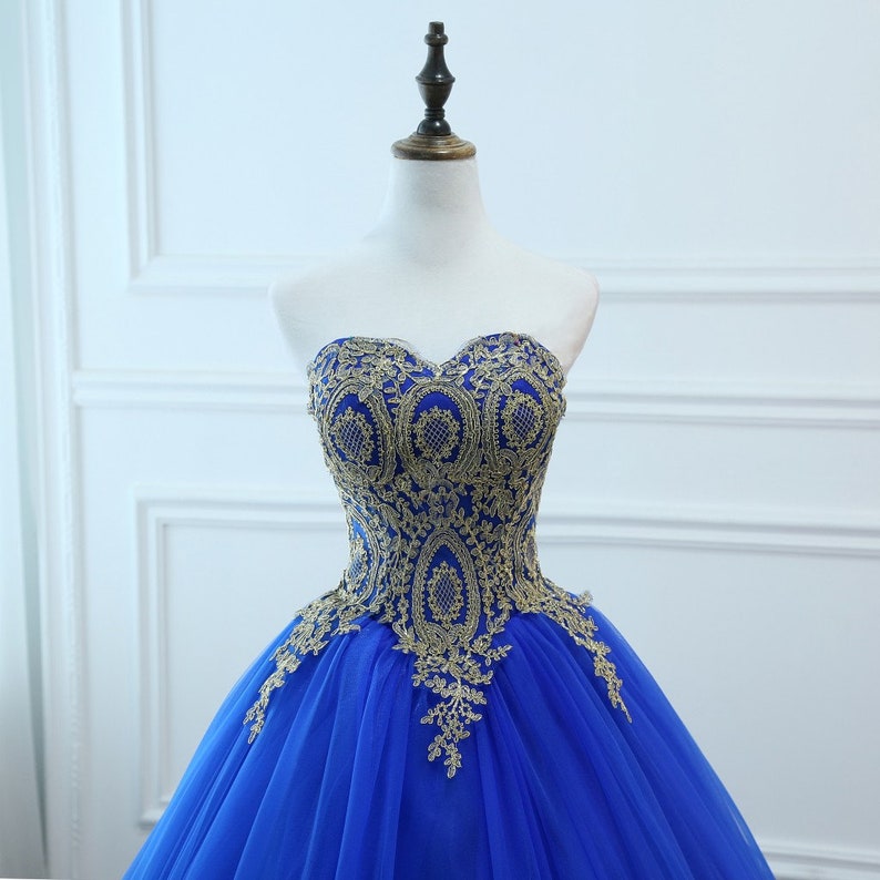 light blue and gold ball gown