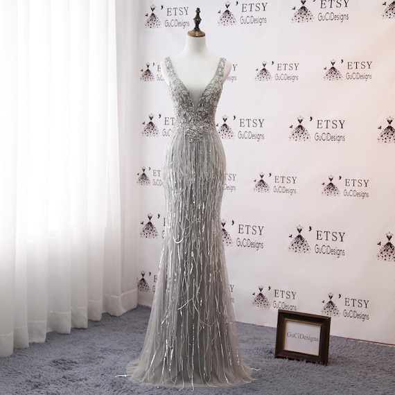 gold trumpet prom dress