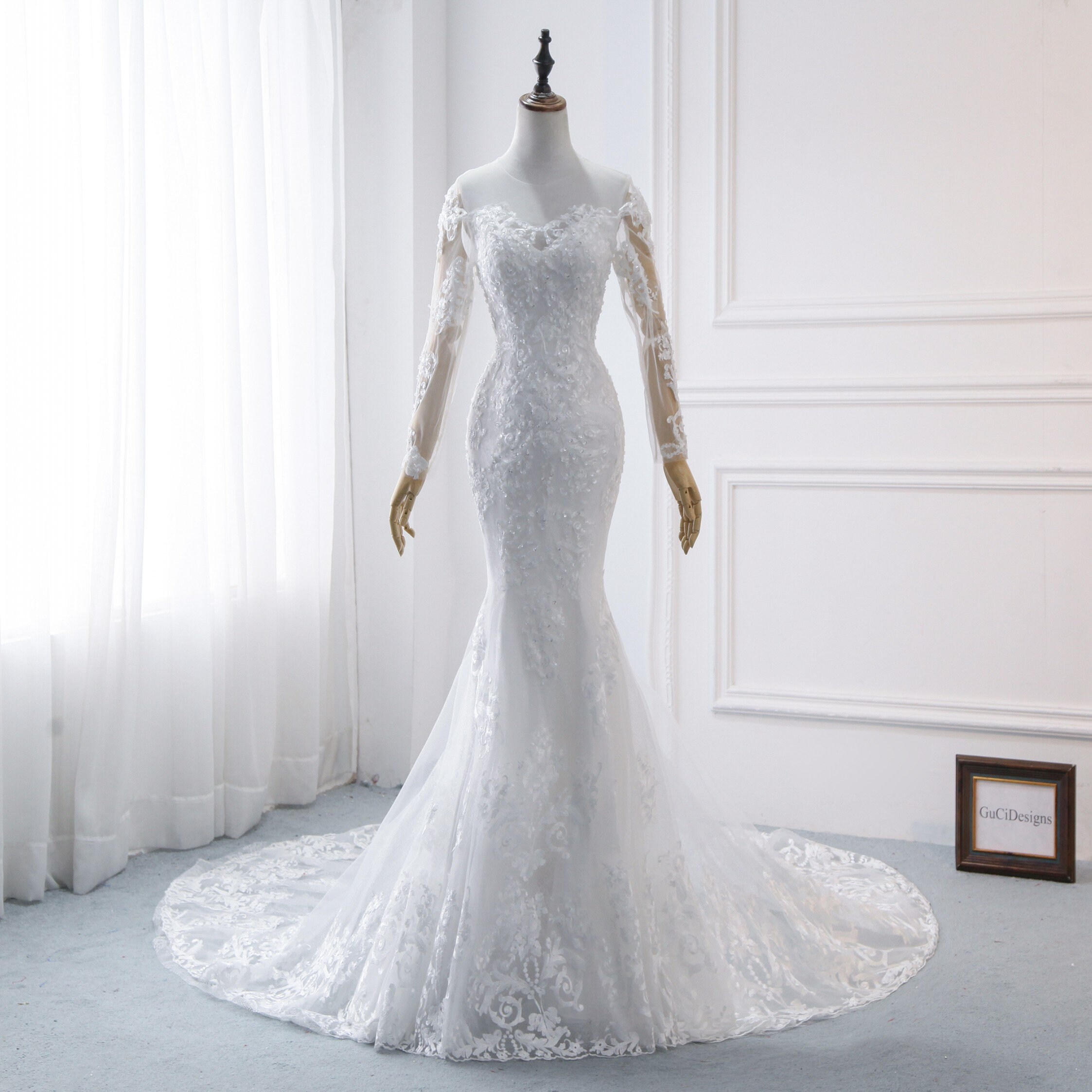 trumpet mermaid long sleeve wedding dress