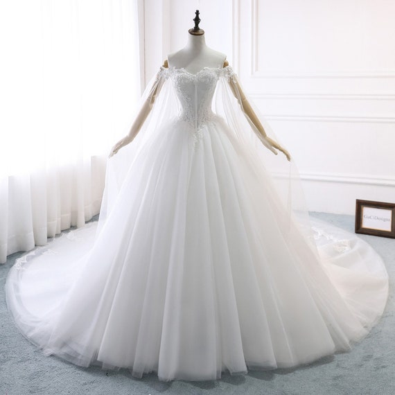 bridal gown with cape