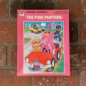 vintage 70s PINK PANTHER whitman jigsaw puzzle . 1975 GEN X saturday morning cartoons . seventies animation cartoon cat . inspector clouseau