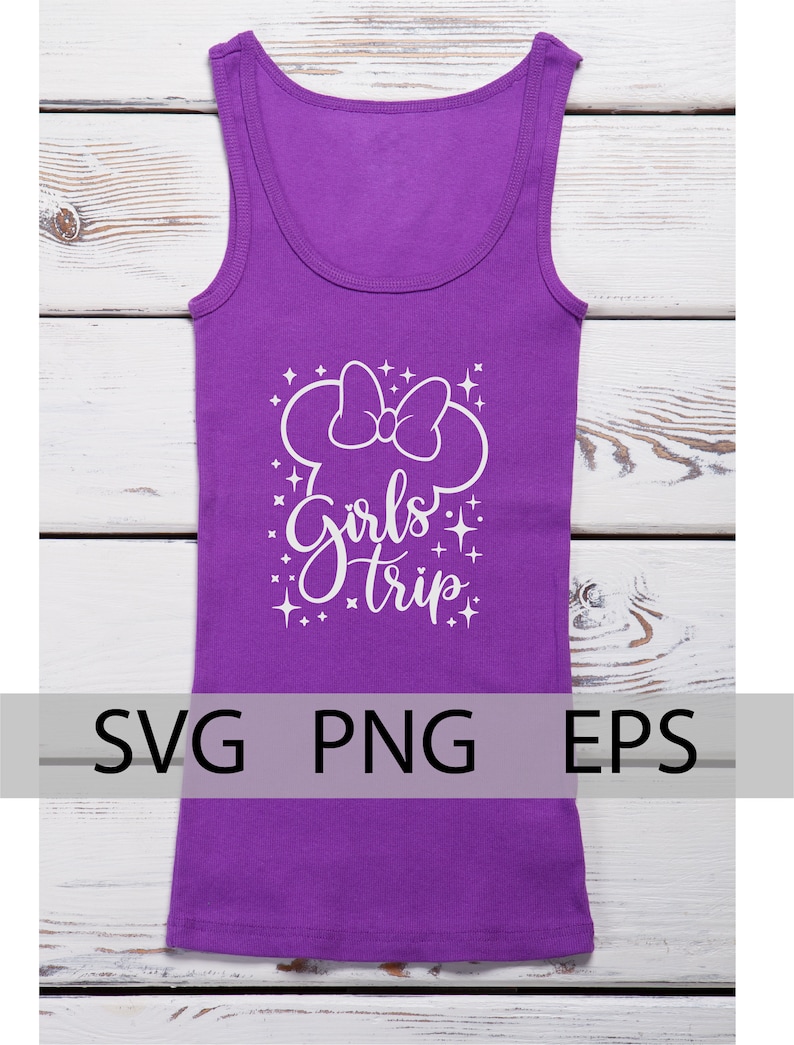 May include: Purple tank top with a white graphic of a mouse head with a bow and the text "Girls Trip" with stars around it.