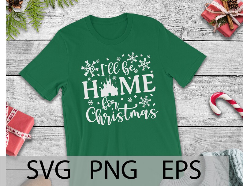 May include: Green t-shirt with white text that reads "I'll be home for Christmas" and a white silhouette of a castle.