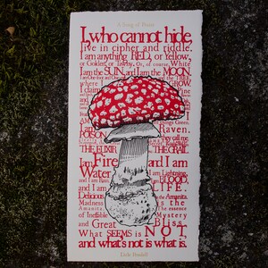 May include: A red and white mushroom with white spots on the cap, illustrated on a white background with black text. The text reads "I who cannot hide, live in cipher and riddle. I am anything RED, or Yellow, or Gokdert, or Tawny. Or, of course, White I am the SUN and I am the MOON. I am One-foot and One- ... and what's not is what is. Dale Pendell"