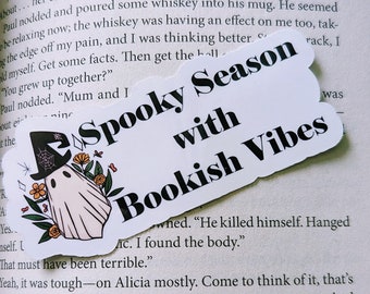 May include: A white sticker with a ghost illustration and the text "Spooky Season with Bookish Vibes".