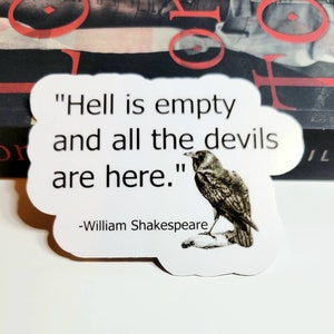 May include: White sticker with a black and white illustration of a raven. The sticker features the quote "Hell is empty and all the devils are here." attributed to William Shakespeare.
