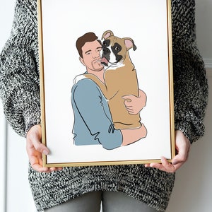 Pode incluir: Uma impress&atilde;o de arte emoldurada com uma moldura dourada, apresentando um desenho linear de uma pessoa abra&ccedil;ando um c&atilde;o Boxer. A pessoa est&aacute; vestindo uma camisa azul e o c&atilde;o &eacute; marrom e branco. O fundo &eacute; branco.