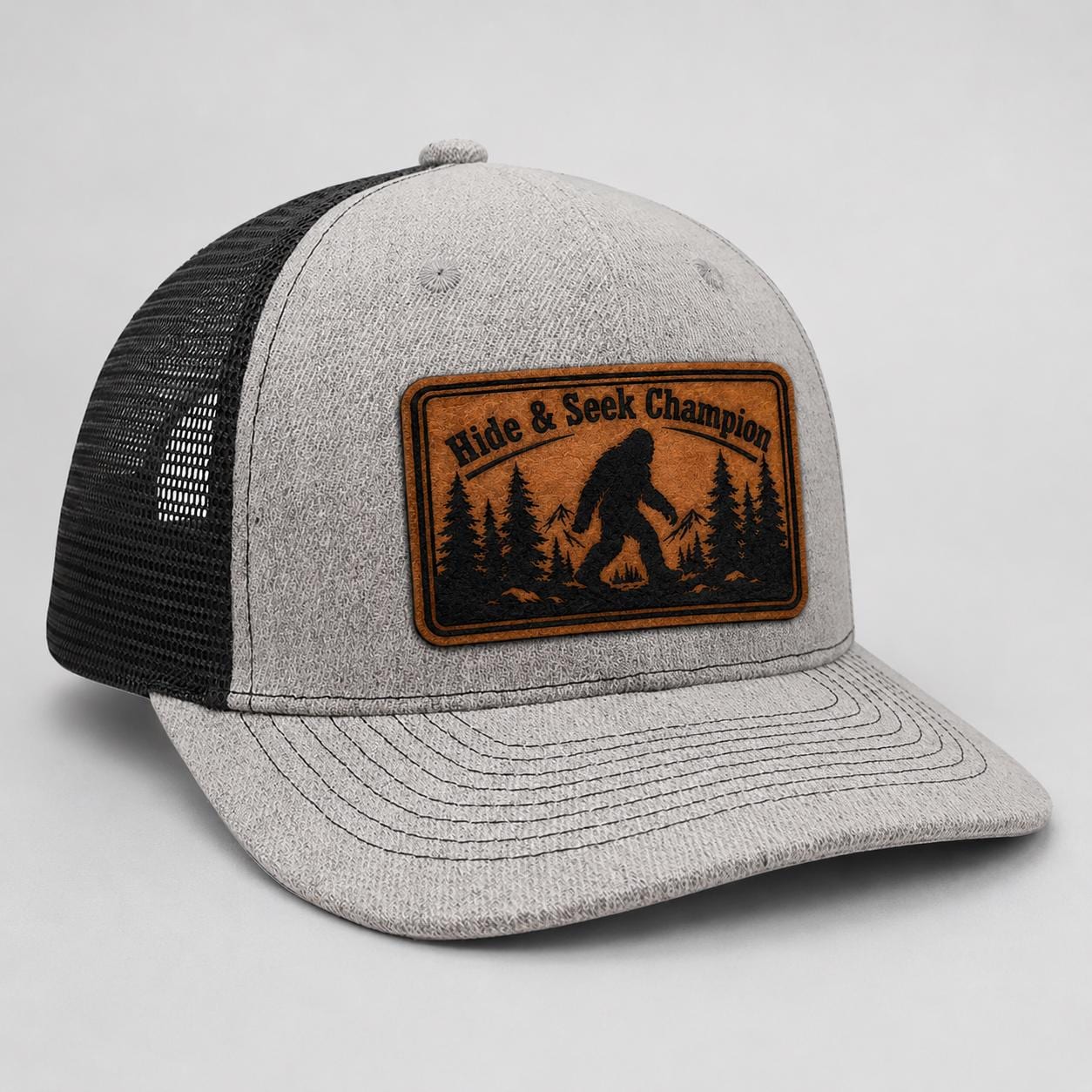 Hide and Seek Champion Hat, Bigfoot Trucker Hat, Funny Sasquatch Leather Patch Hat, Cryptid Snapback, Gift for Bigfoot Fan