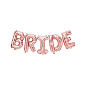 May include: Rose gold foil balloon letters spelling out the word "BRIDE".