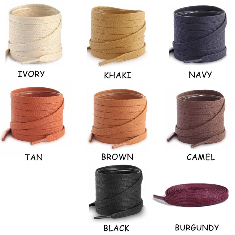 May include: A set of 10 different coloured shoelaces, including ivory, khaki, navy, tan, brown, camel, black, and burgundy. The shoelaces are all made of a woven fabric and are arranged in two rows of five.