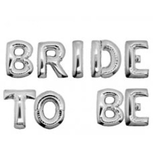May include: Silver foil letter balloons spelling out "Bride to Be".